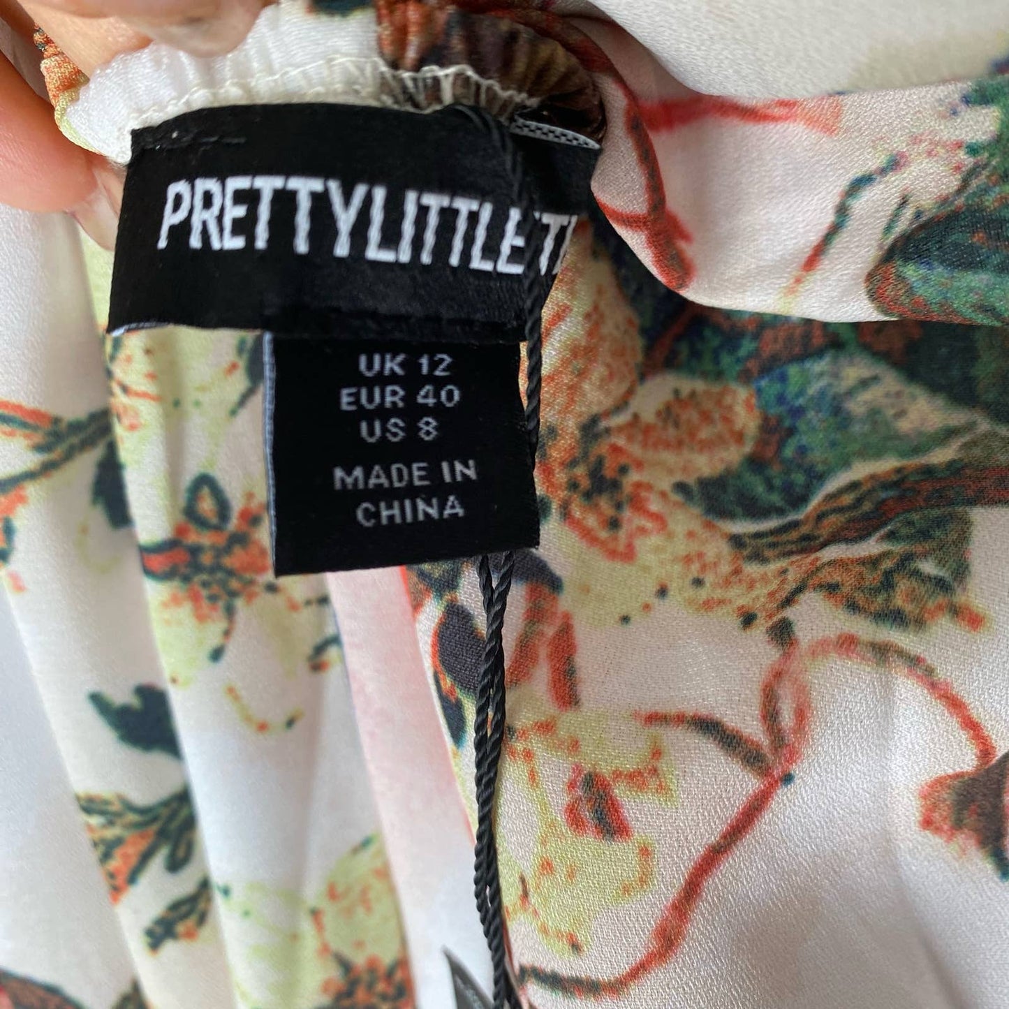 Pretty Little Things sz 8 Multi floral print halter neck wide leg jumpsuit NWT