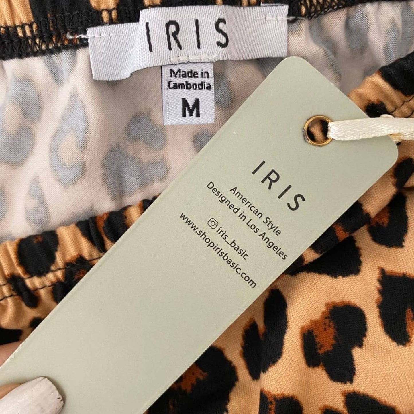 Iris Basic sz S cheetah off shoulder bodysuit blouse NWT
